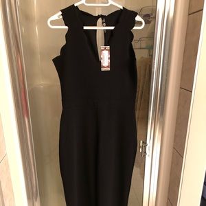 Black Jumpsuit with scalloped edges